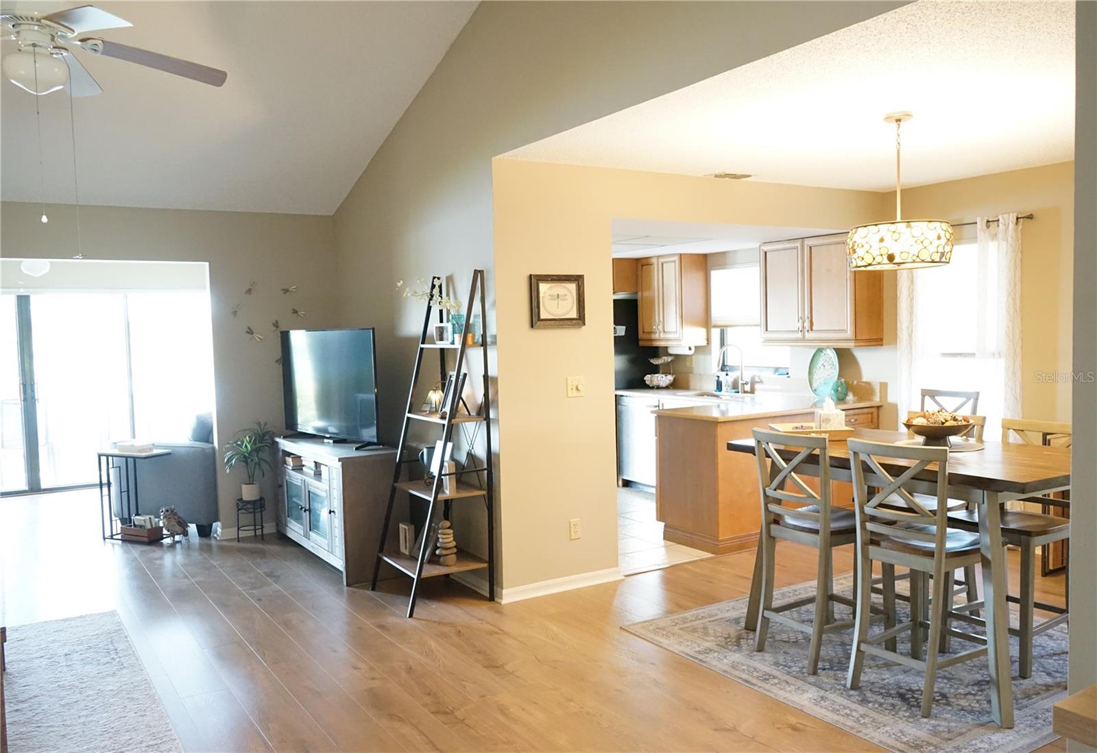 living room adjacent to dining area