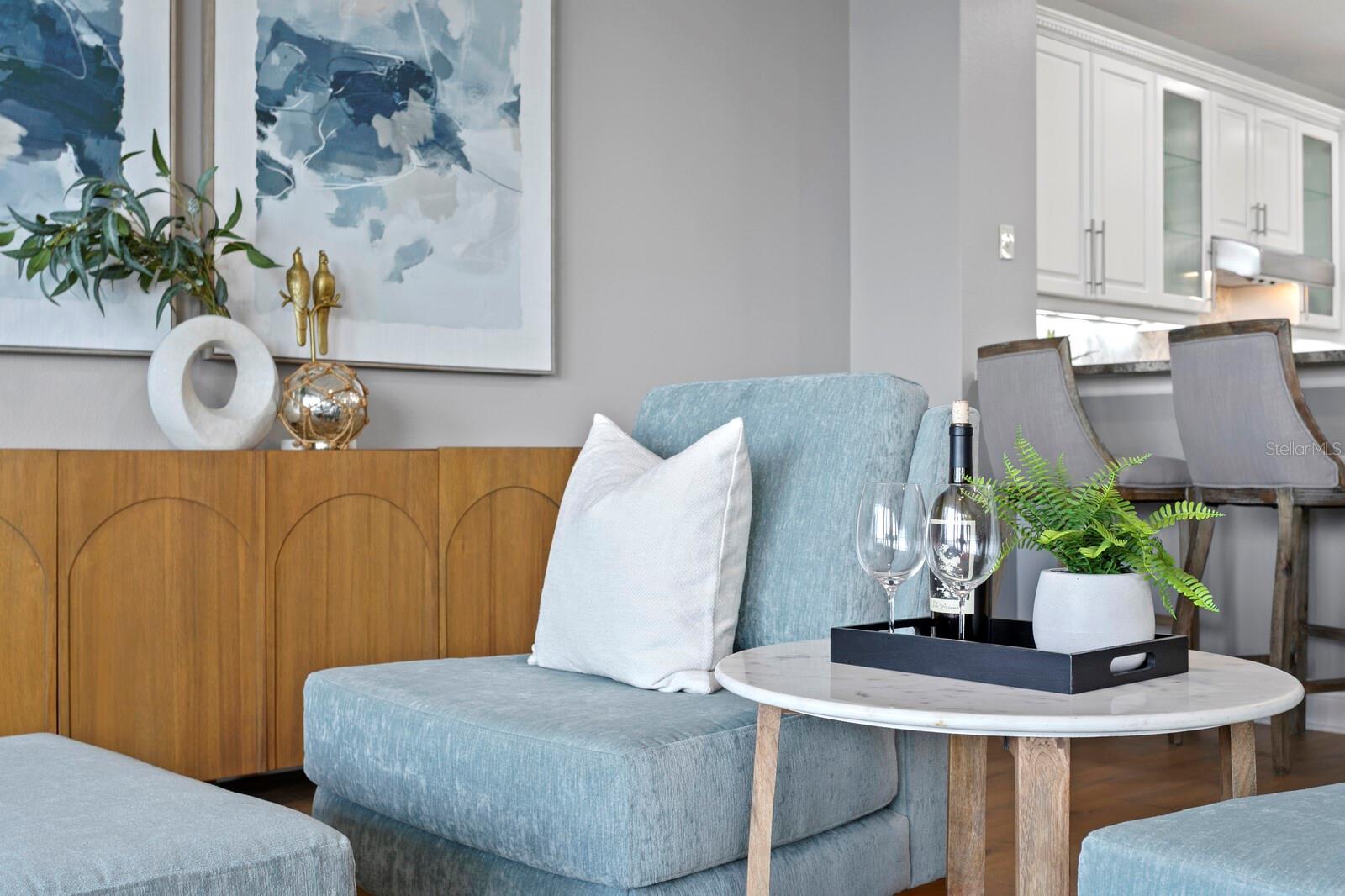 COZY SEATING CONNECTS TO LIVING ROOM AND KITCHEN