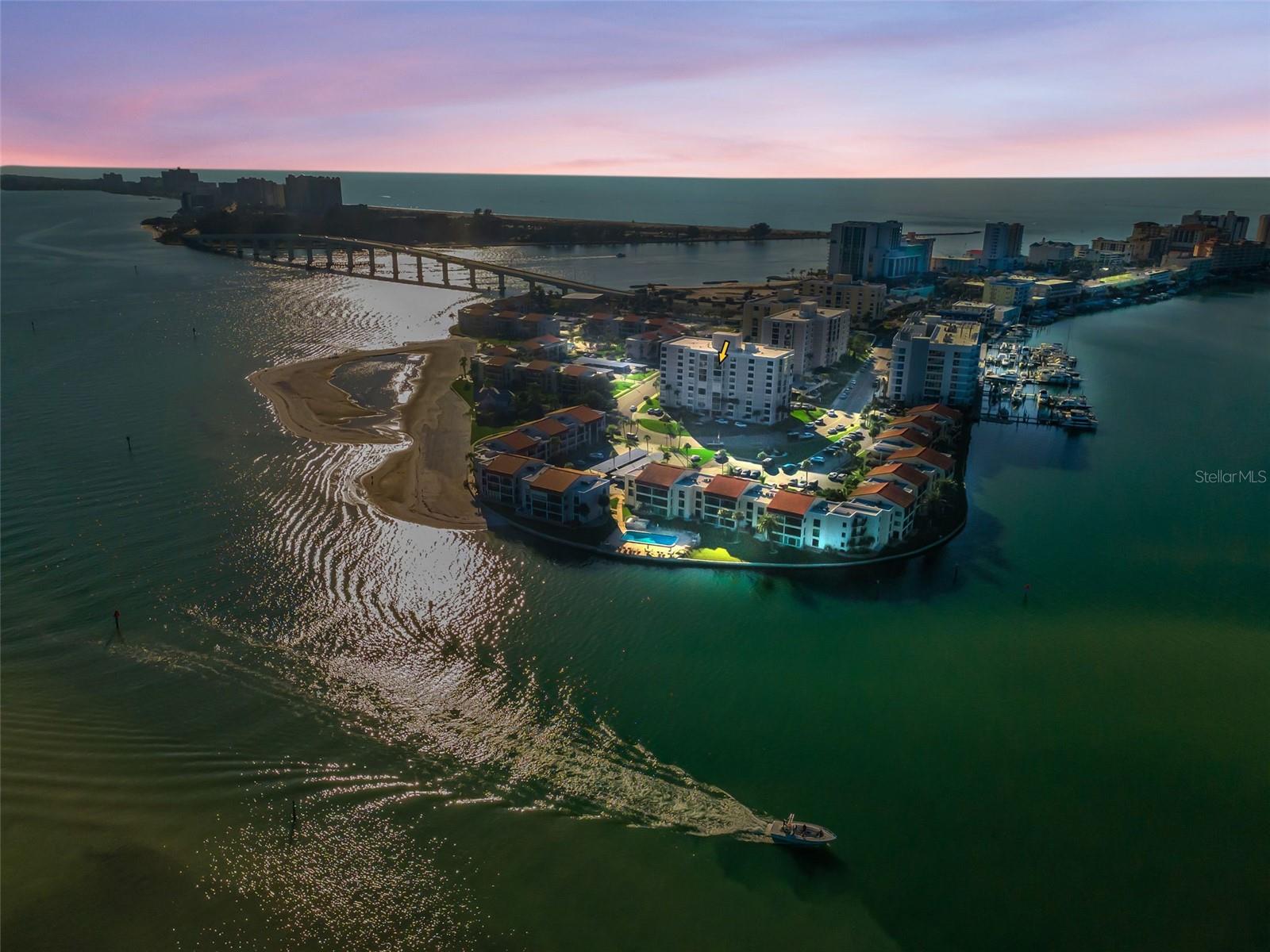 Open water view from 8th floor unit; yellow arrow