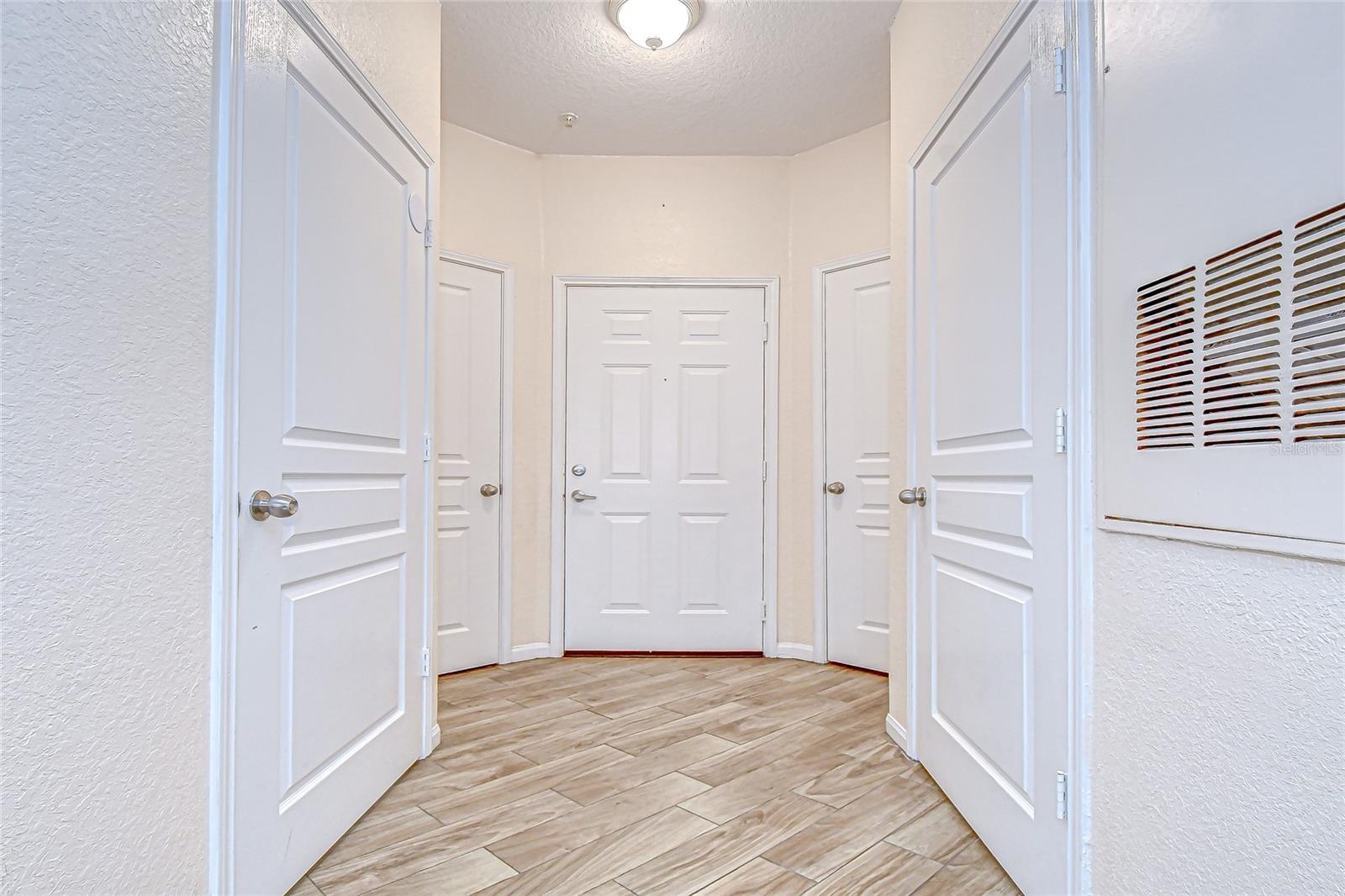 Bright entryway with storage closet!