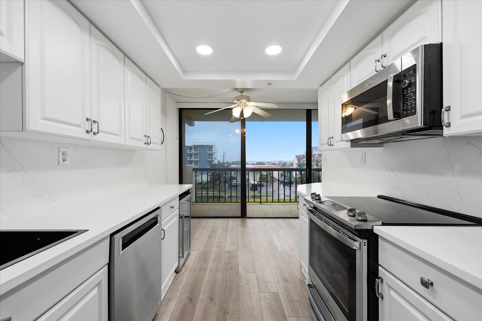 Kitchen w/ Bistro eating area opens to sunrise on balconey