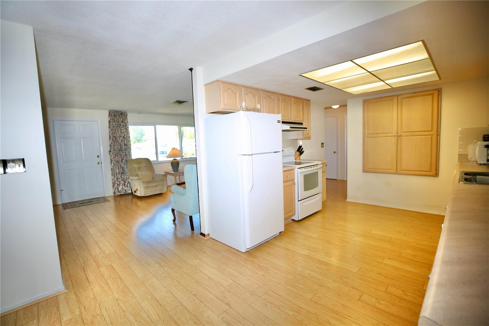 Large kitchen with Maple cabinetry