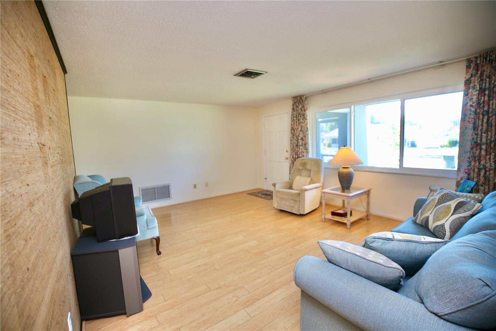 Living room on west side of home