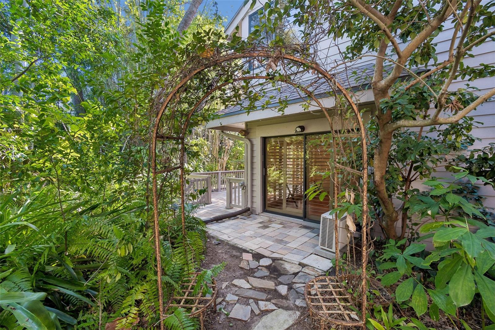 Side terrace accessible from the Breakfast/Sun Room off of Kitchen