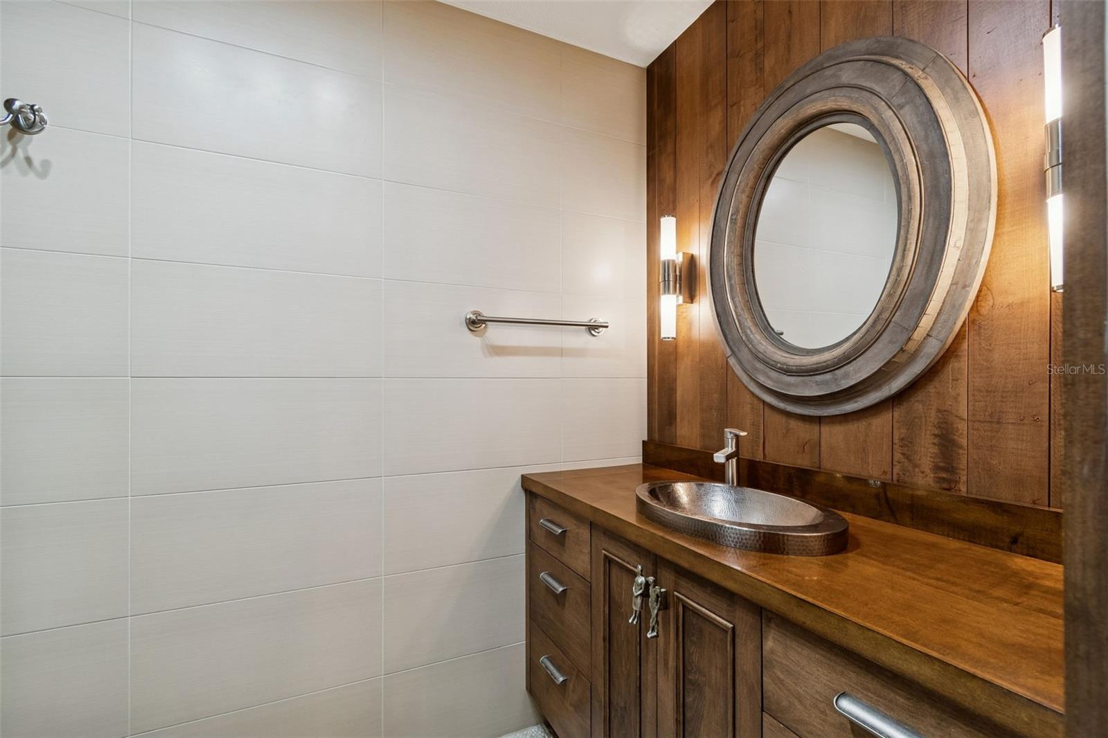 Bathroom 3 across from bedroom with custom shower, on main level