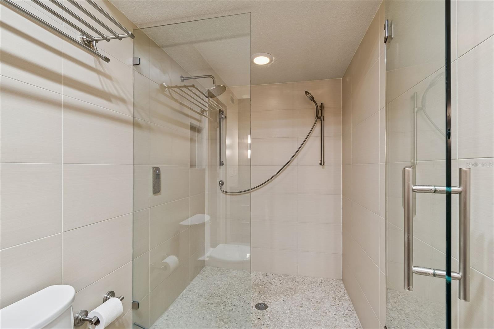 Bathroom 3 across from bedroom, custom shower, on first level