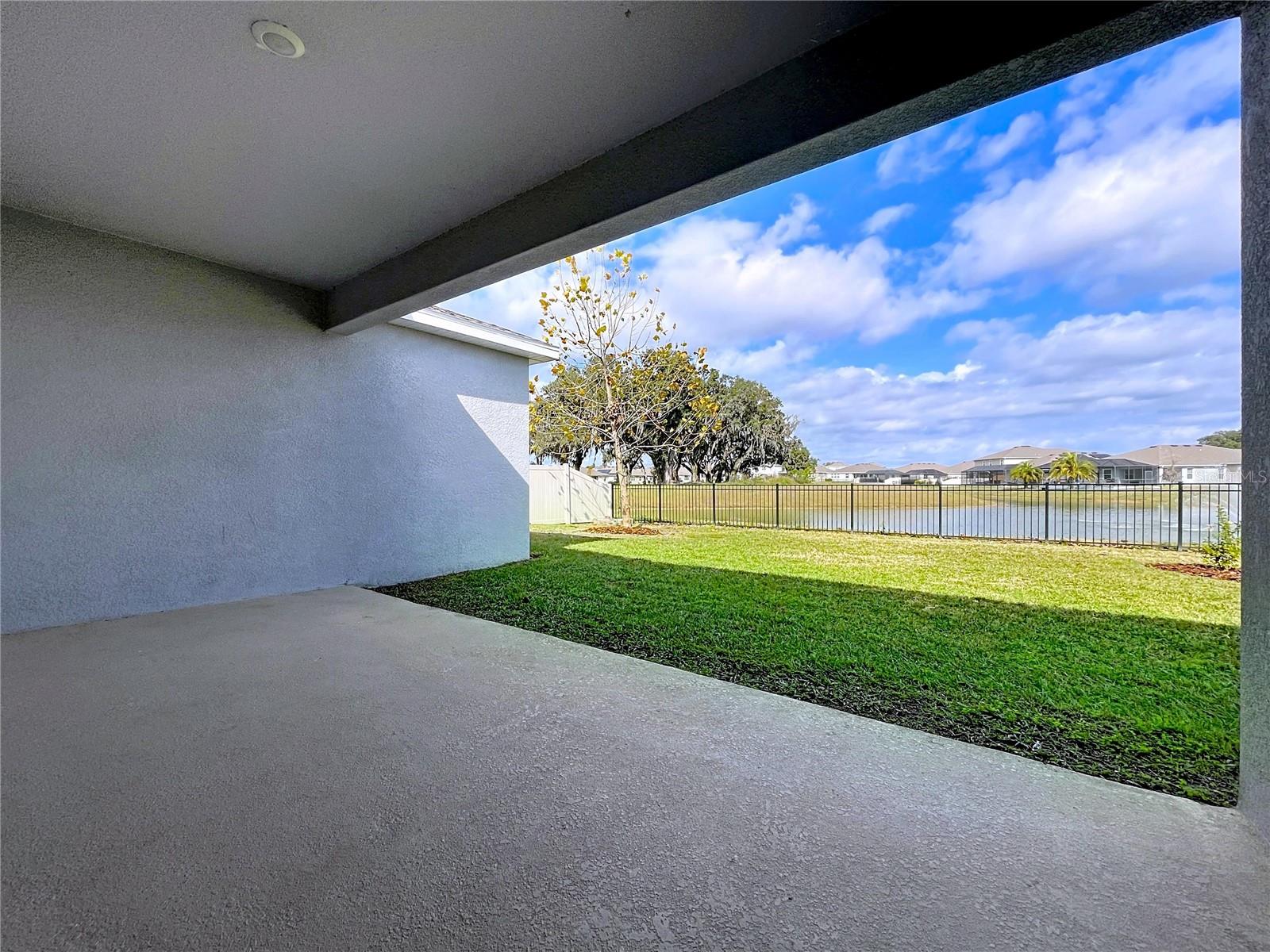 COVERED PATIO WITH POND VIEW