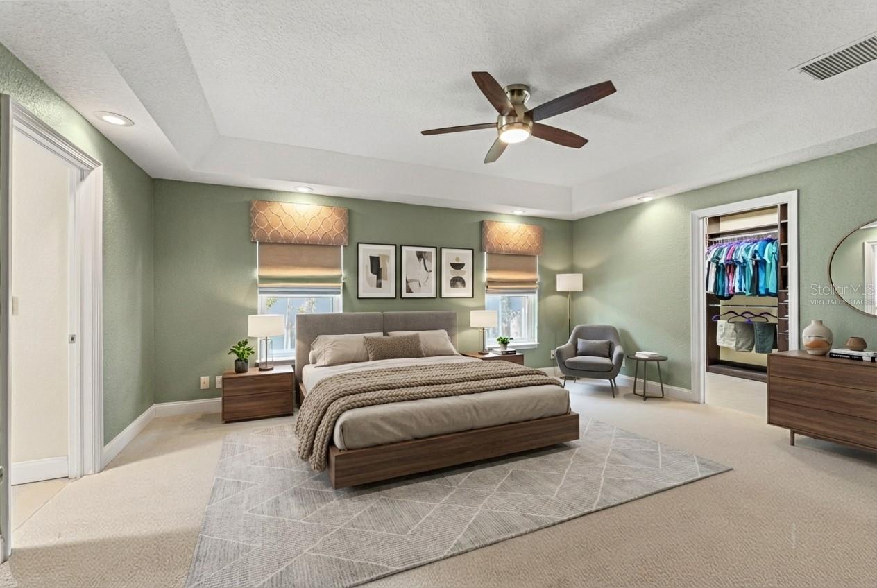 Large primary suite virtually staged