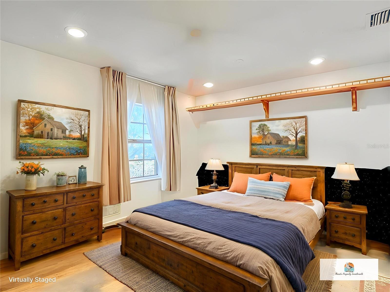 Staged 2nd bedroom furniture and flooring