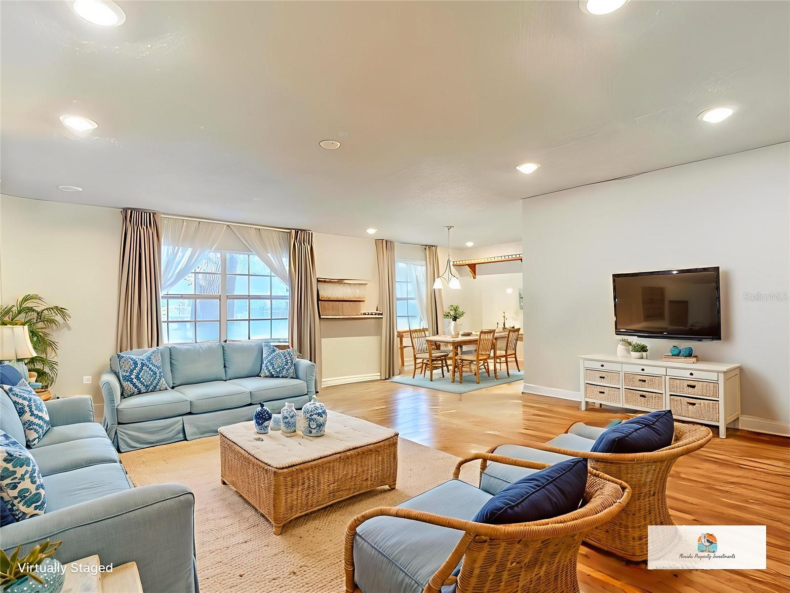 Staged living & dining room furniture and flooring