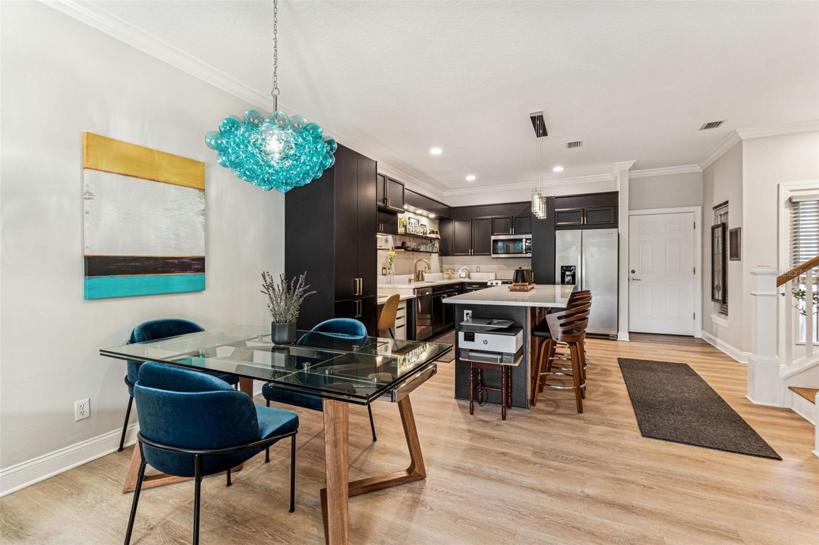 Glass expandable table can seat 8 and is available for purchase