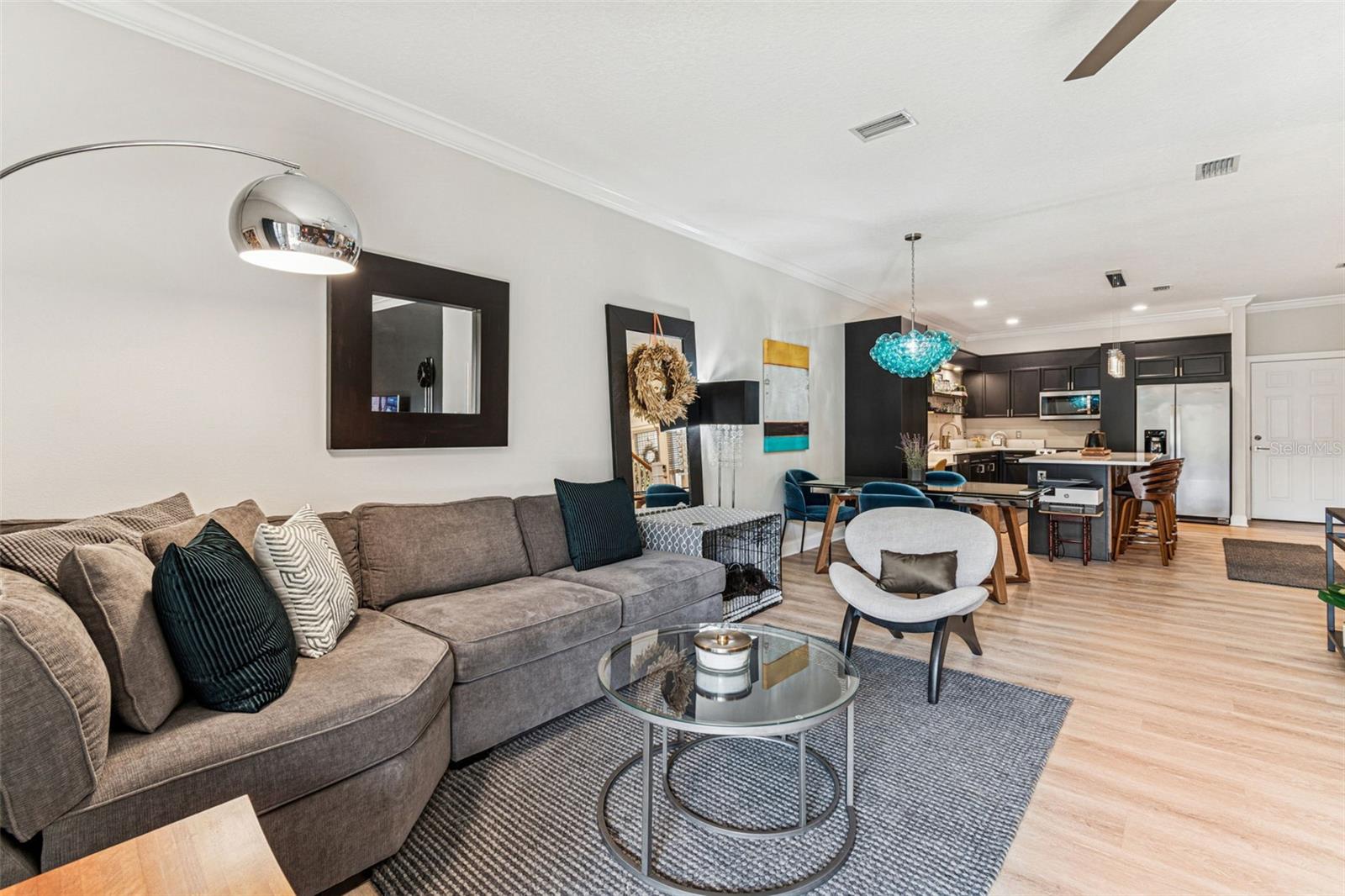 Newer, light cherry colored waterproof, vinyl plank flooring thru-out.