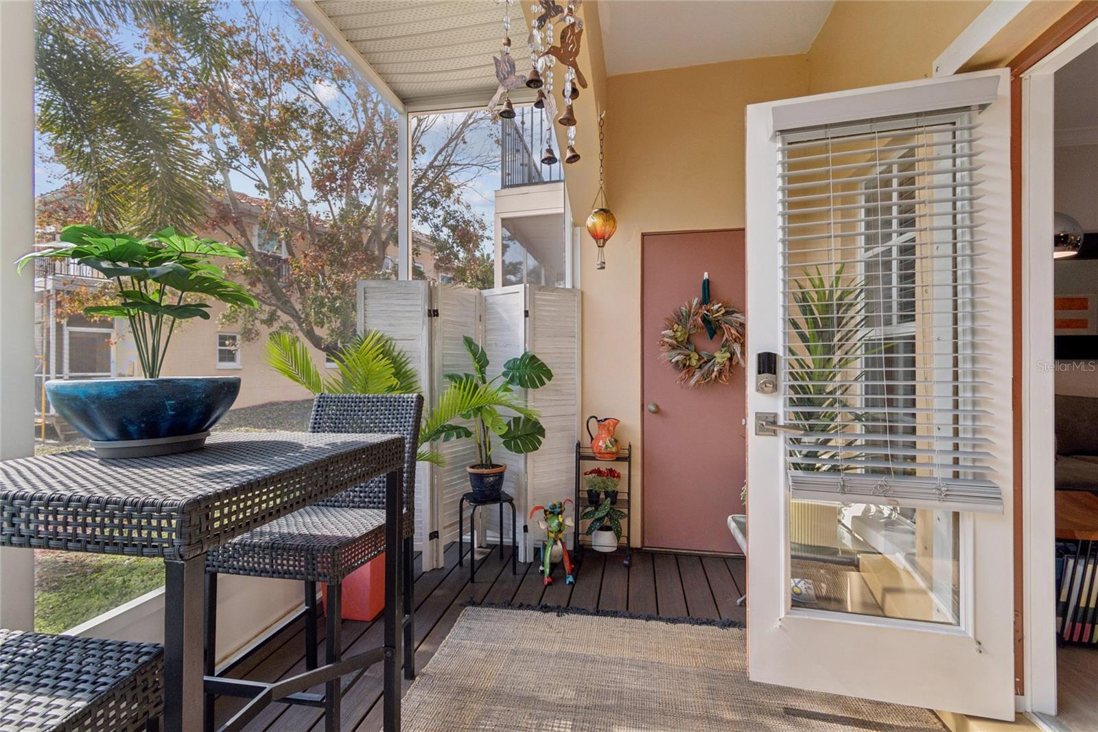Screened porch with storage closet and hurricane shutters