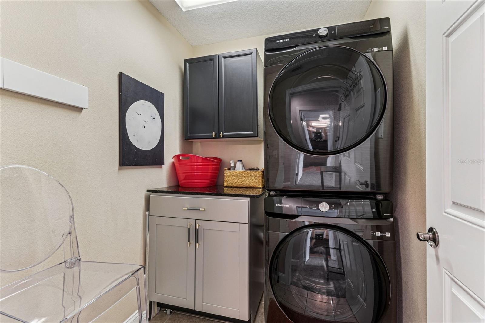 Laundry room with Samsung programmable wash/dryer