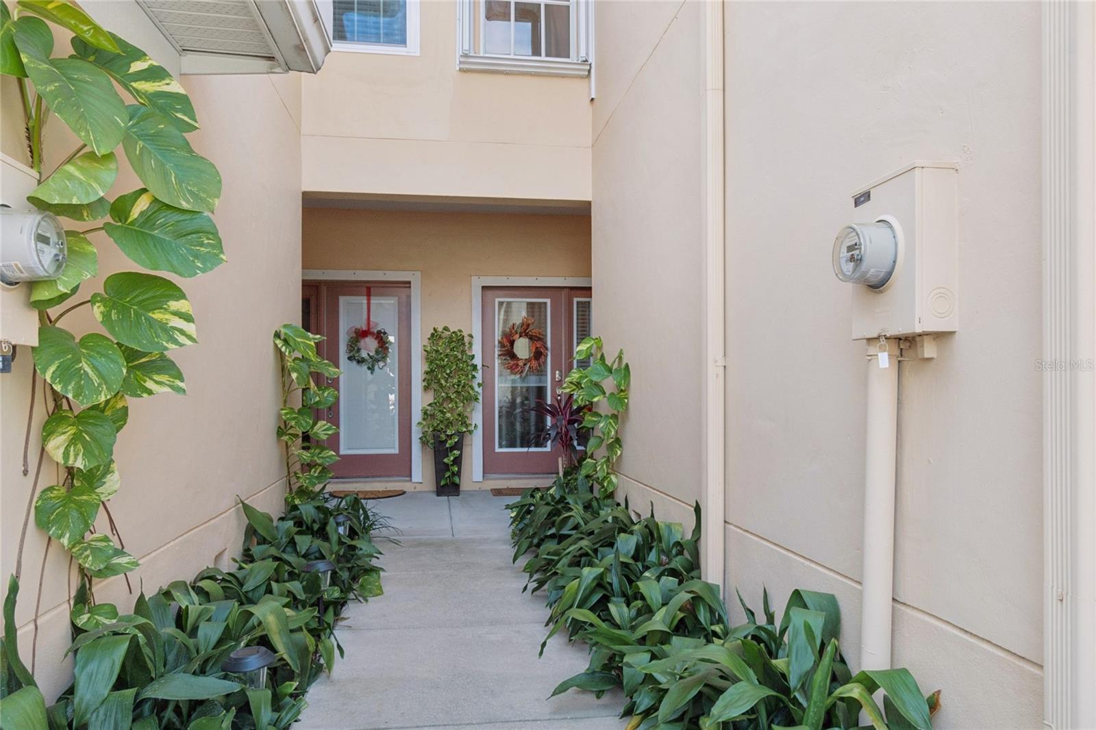 Entryway to 255 Valencia Cir., on right. Wonderful neighbors!