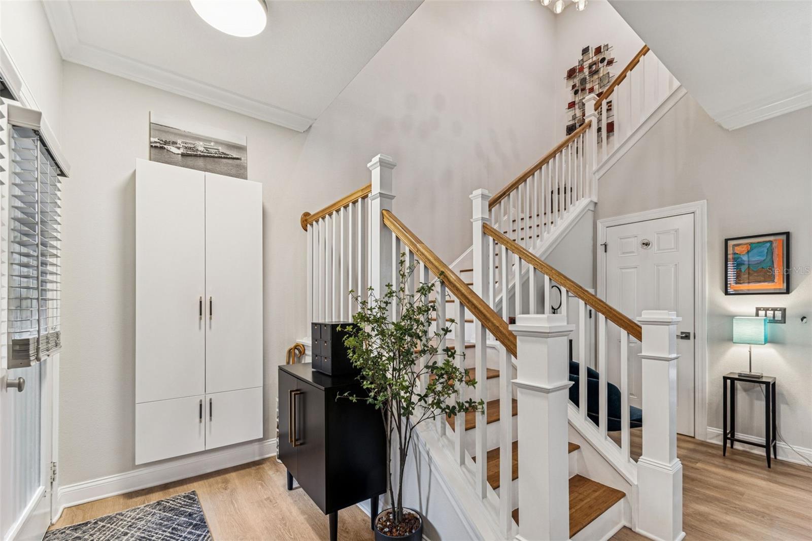 Entryway with built-in coat/hat closet