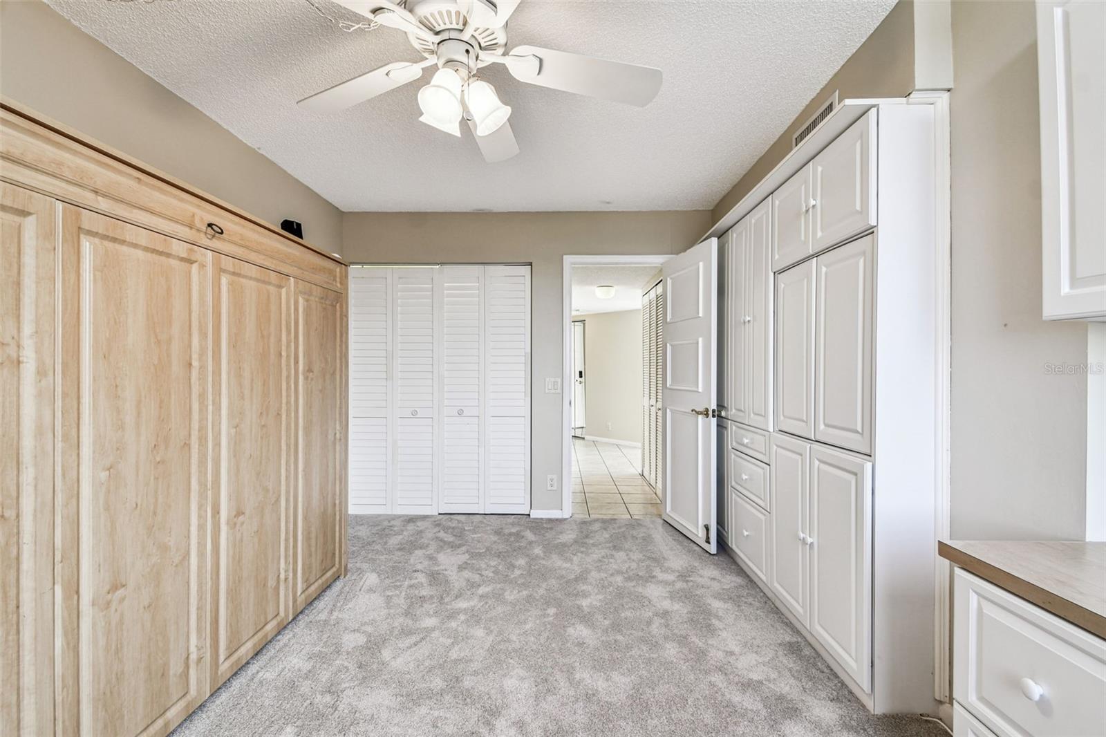 2nd bedroom with Murphy Bed and built ins