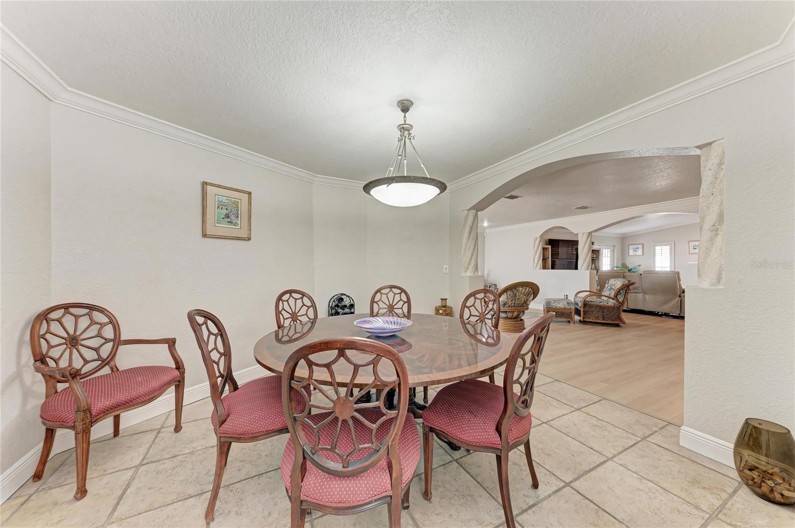 Dining room sits conveniently in between the kitchen and living area