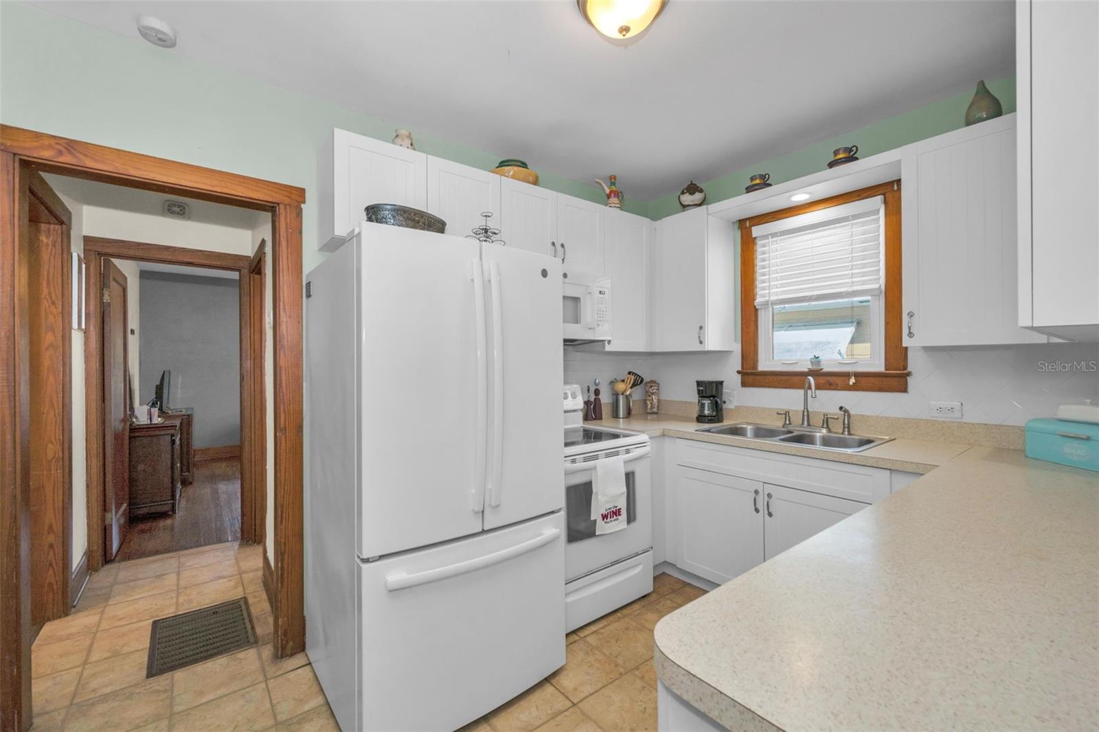 Kitchen has large walk-in pantry