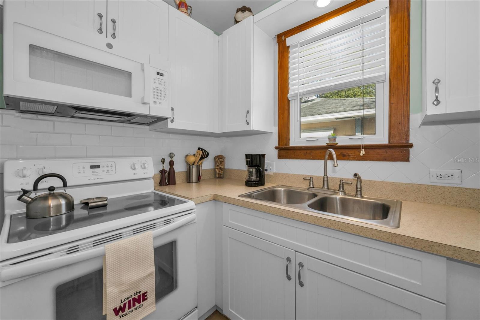 Kitchen has large walk-in pantry