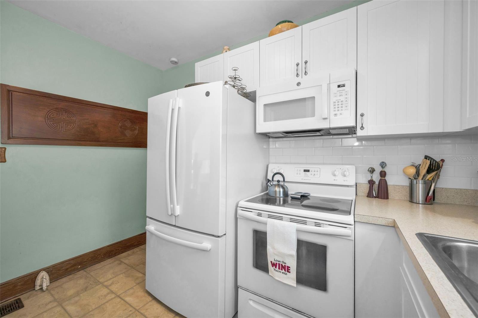 Kitchen has large walk-in pantry