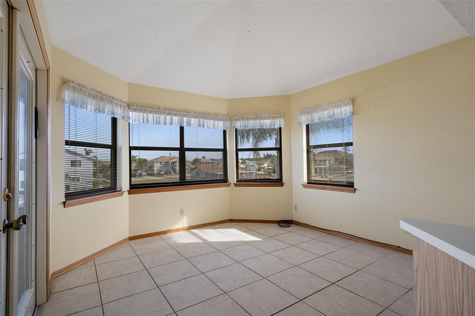 Nook with Beautiful Canal Views and French Doors to Lanai