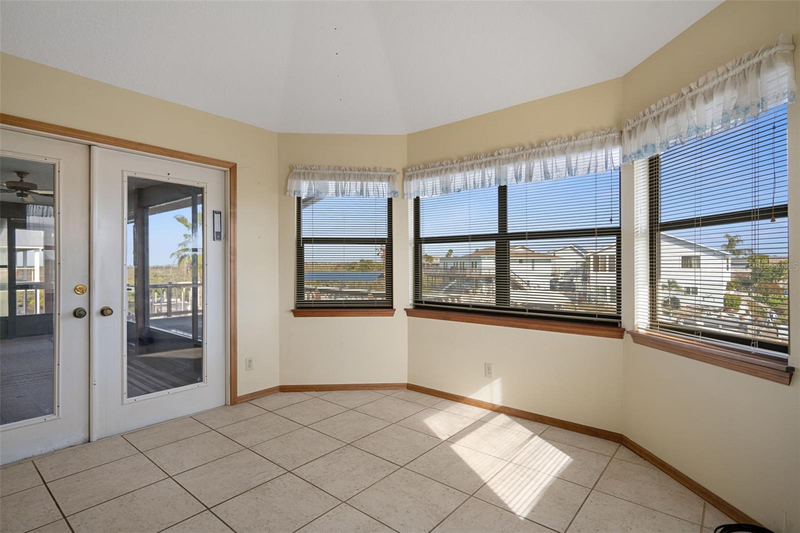 Nook with Beautiful Canal Views and French Doors to Lanai