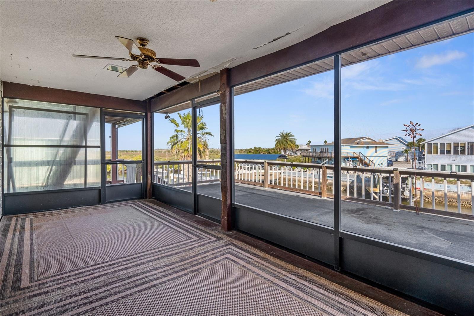 Upper Covered Lanai Overlooking Canal