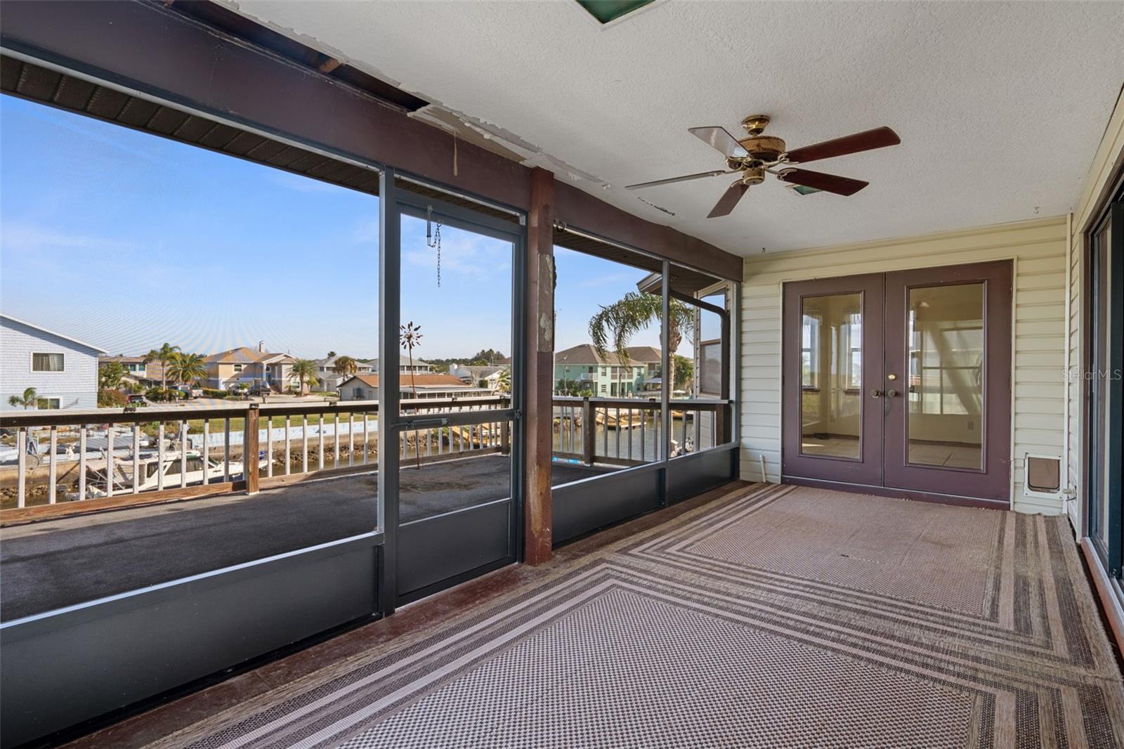Upper Covered Lanai Overlooking Canal