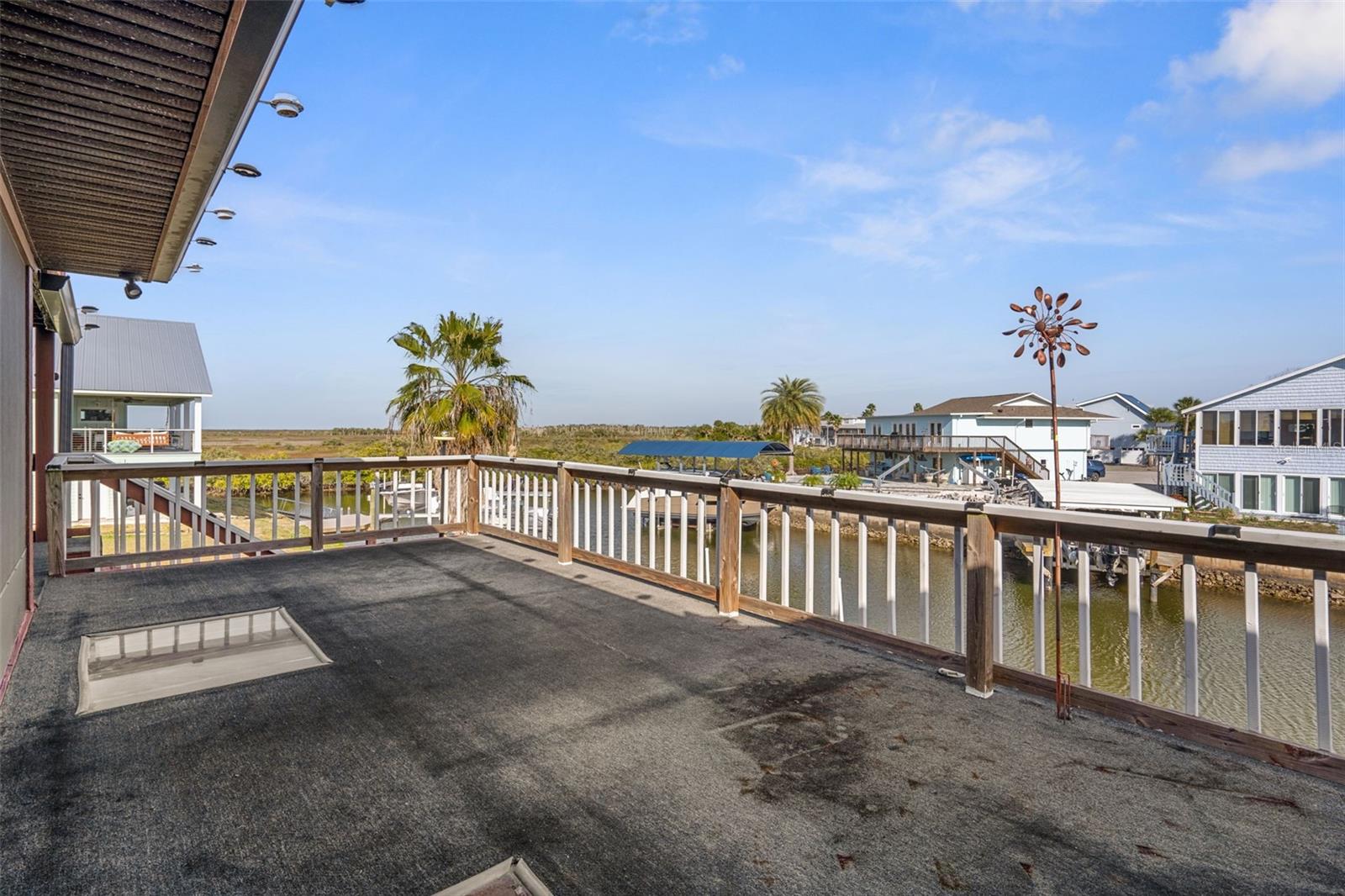 Upper Open Lanai Overlooking Gulf and Canal