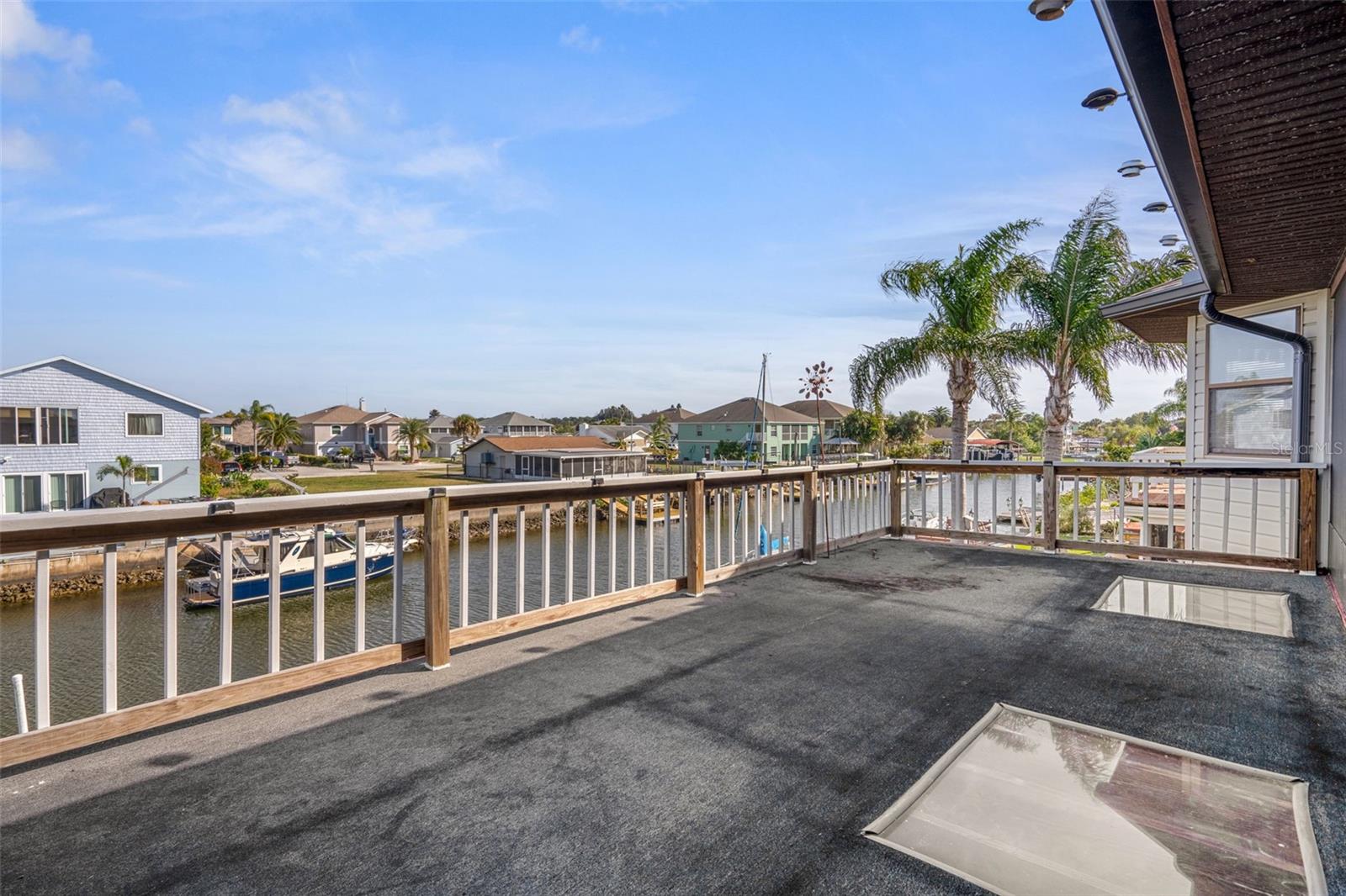 Upper Open Lanai Overlooking Canal