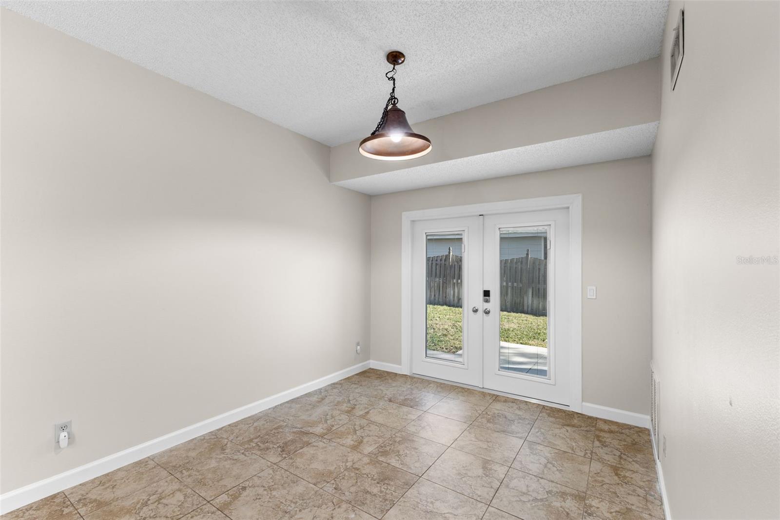 Dining with Side yard patio access