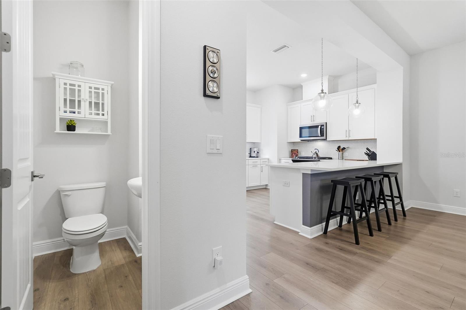 View of kitchen and the half bath on 2nd floor.