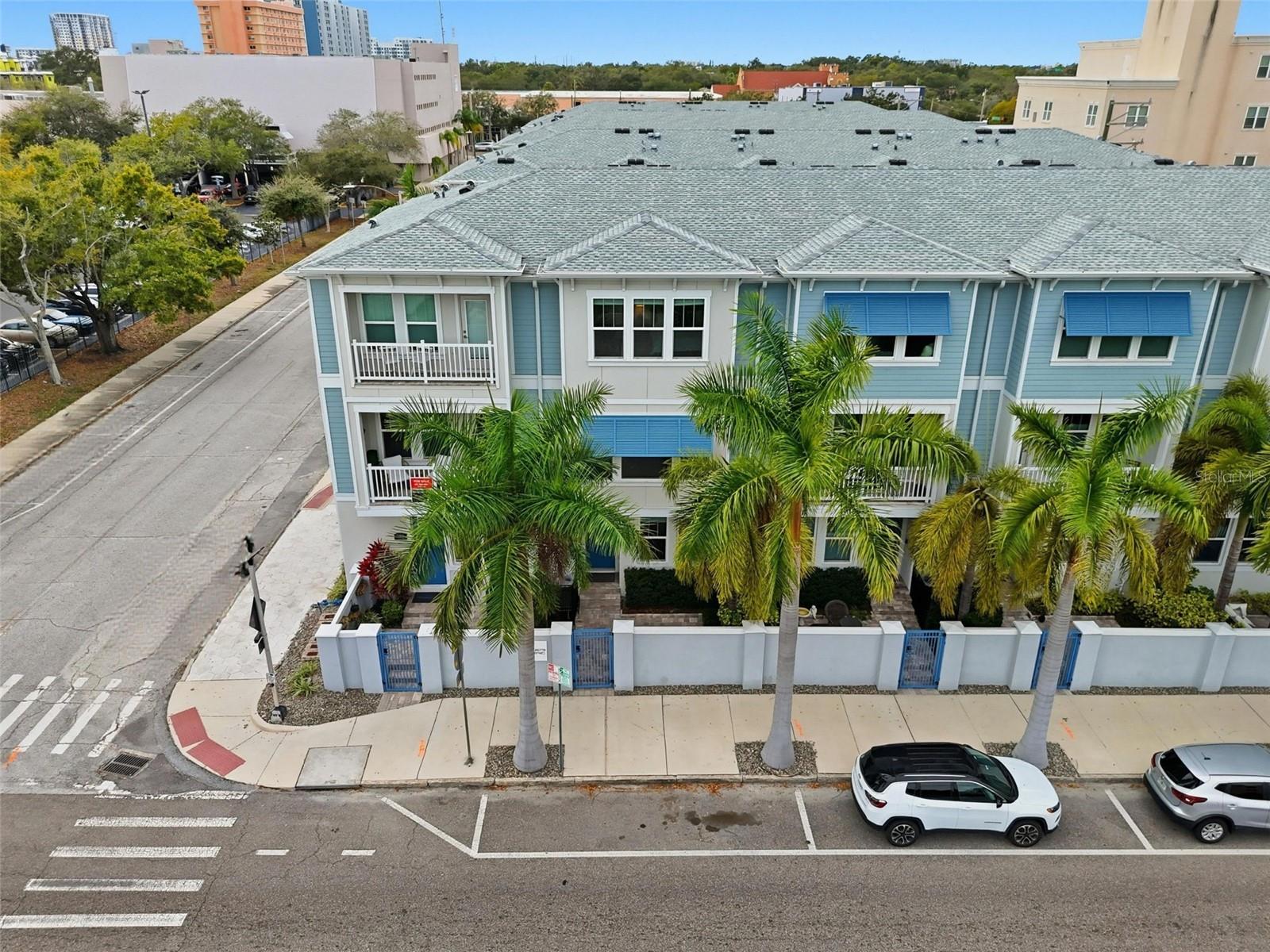 Aerial view of the home from 8th Street. Unit is 2nd from left.