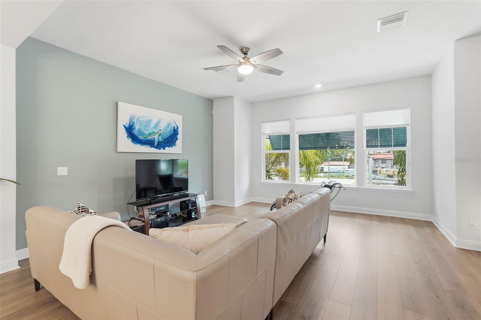 Living area with city views and plenty of natural light.