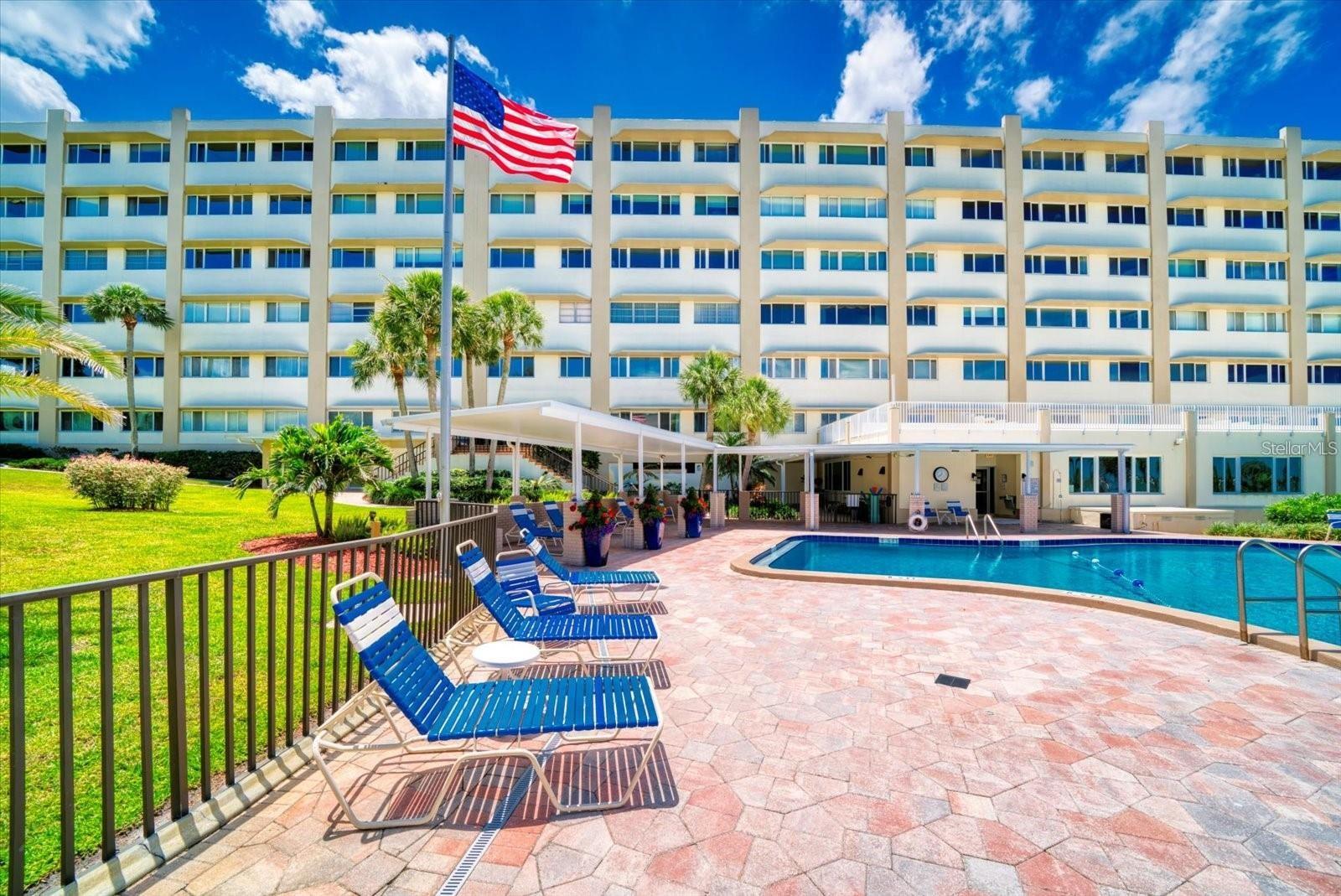 Large and Open swimming pool area, there is also a covered area to get shade from the sun!