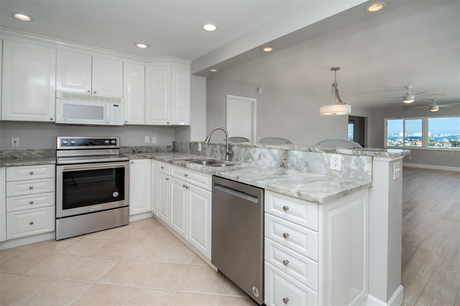 Updated and Open Kitchen to the Dining Room and Family Room.