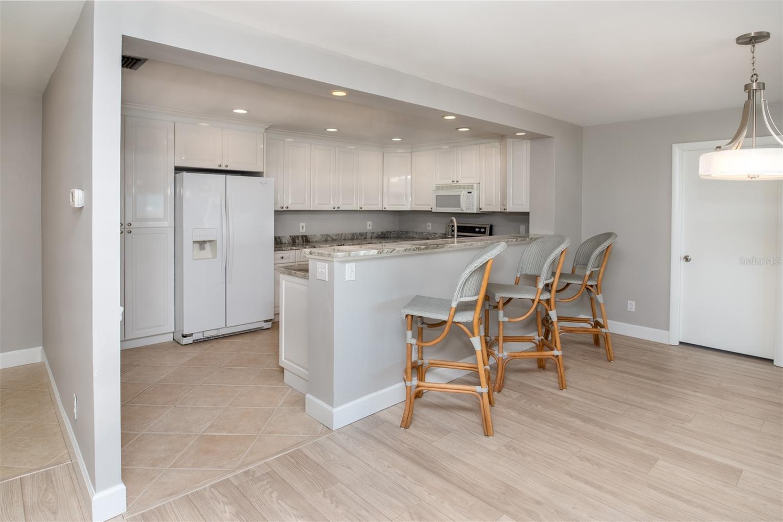 Updated and Open Kitchen to the Dining Room and Family Room.