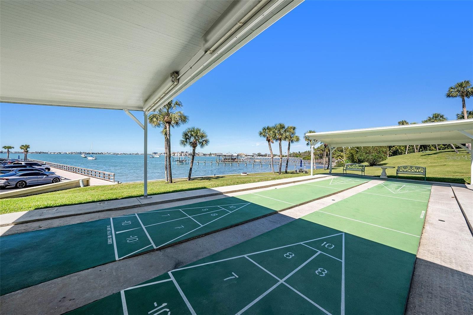 Covered shuffleboard right by the water!