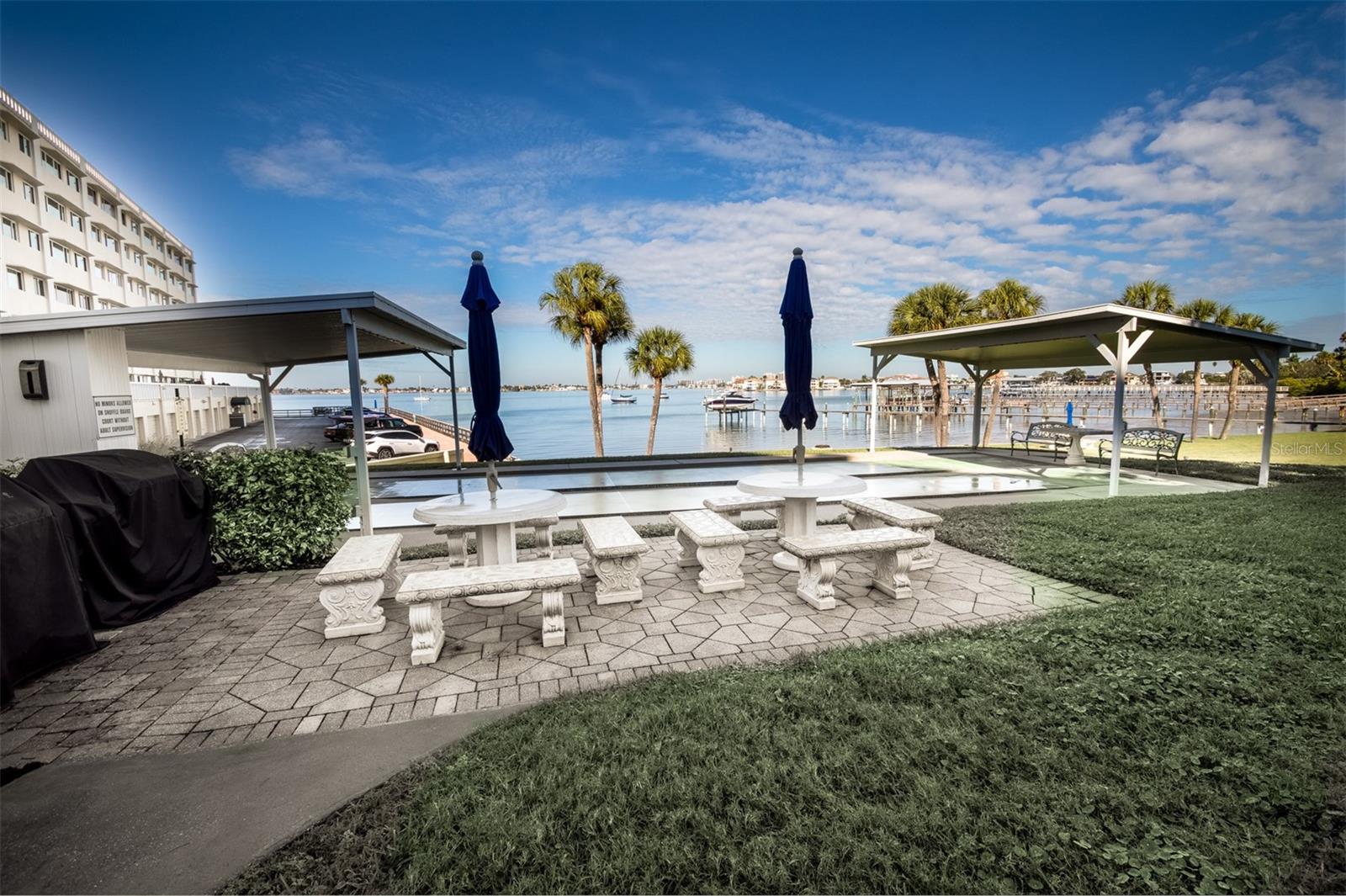 Grilling, sitting and shuffleboard by the water!