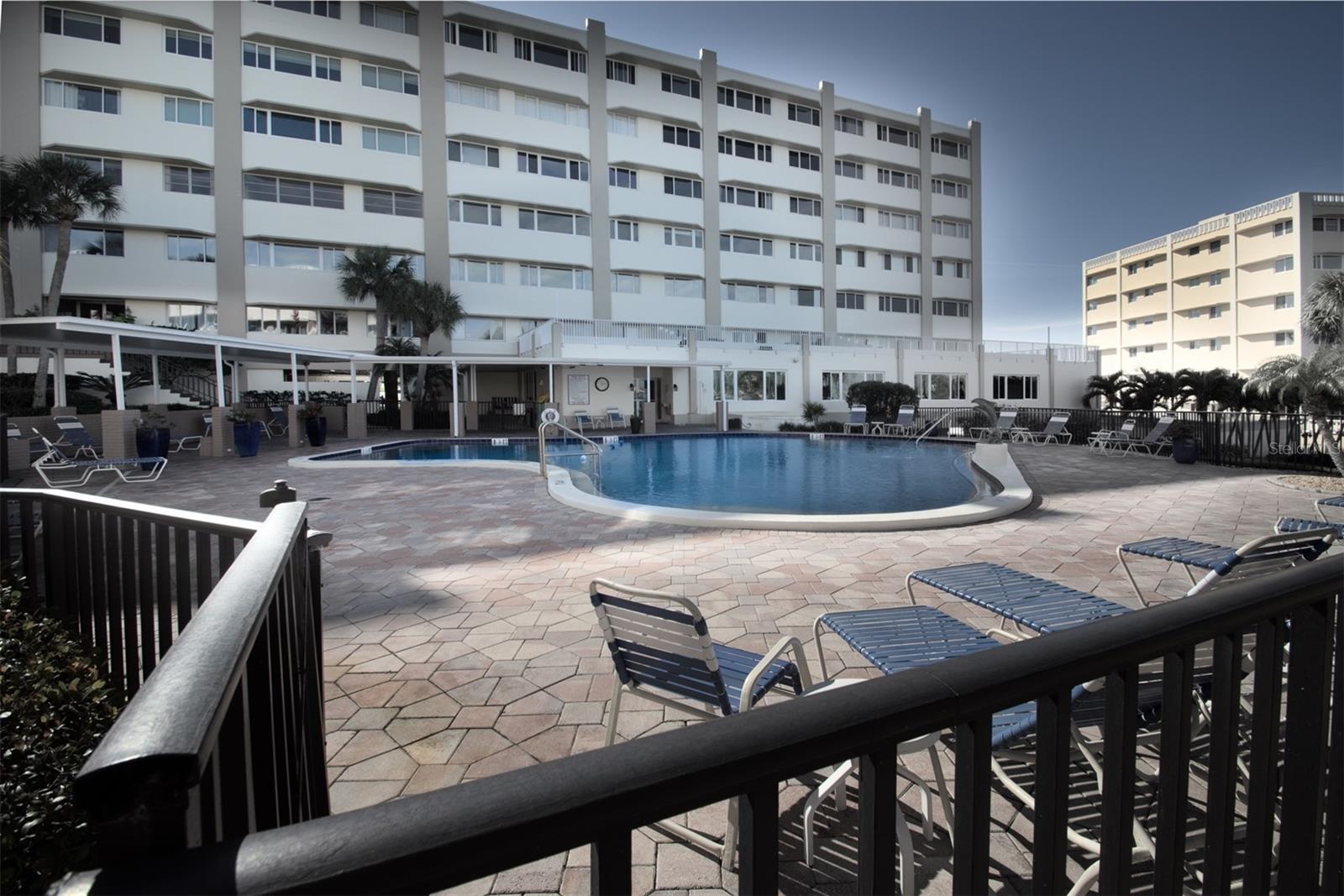 Large and Open swimming pool area, there is also a covered area to get shade from the sun!