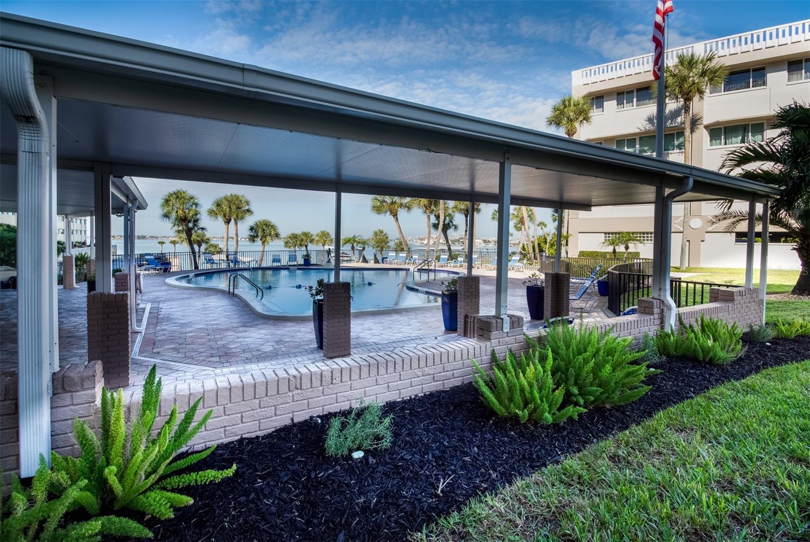 Large and Open swimming pool area, there is also a covered area to get shade from the sun!