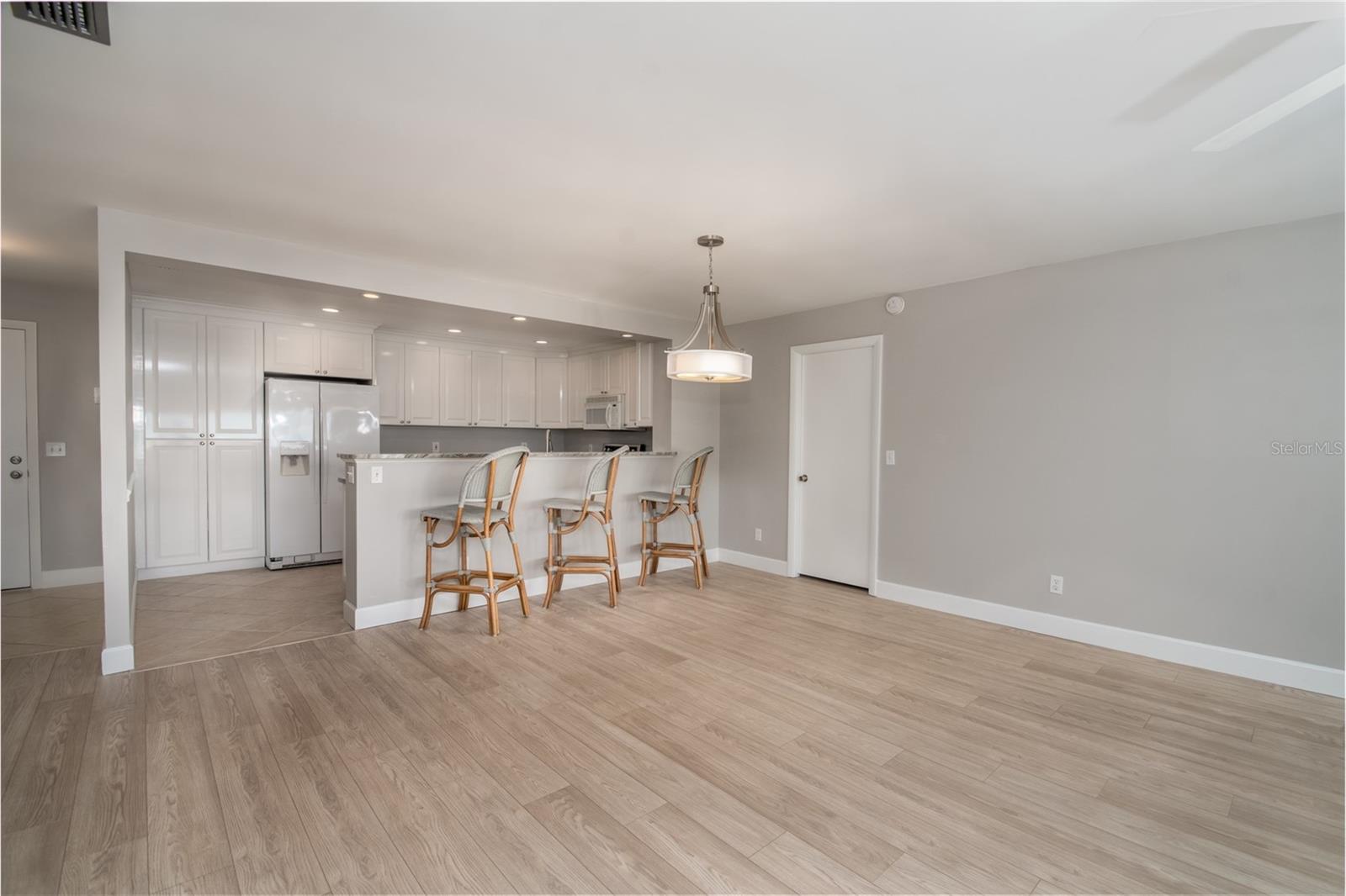 Updated and Open Kitchen to the Dining Room and Family Room.