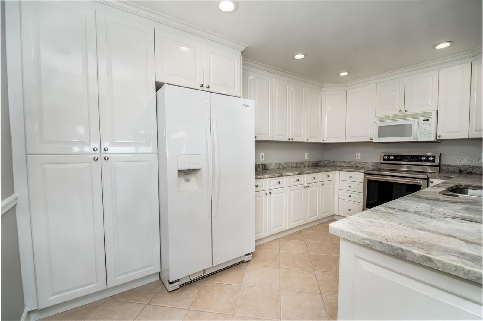 Updated and Open Kitchen to the Dining Room and Family Room.