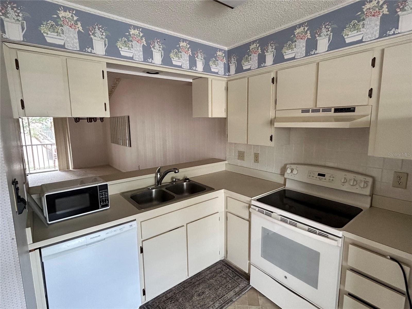 Kitchen looking out to Living room