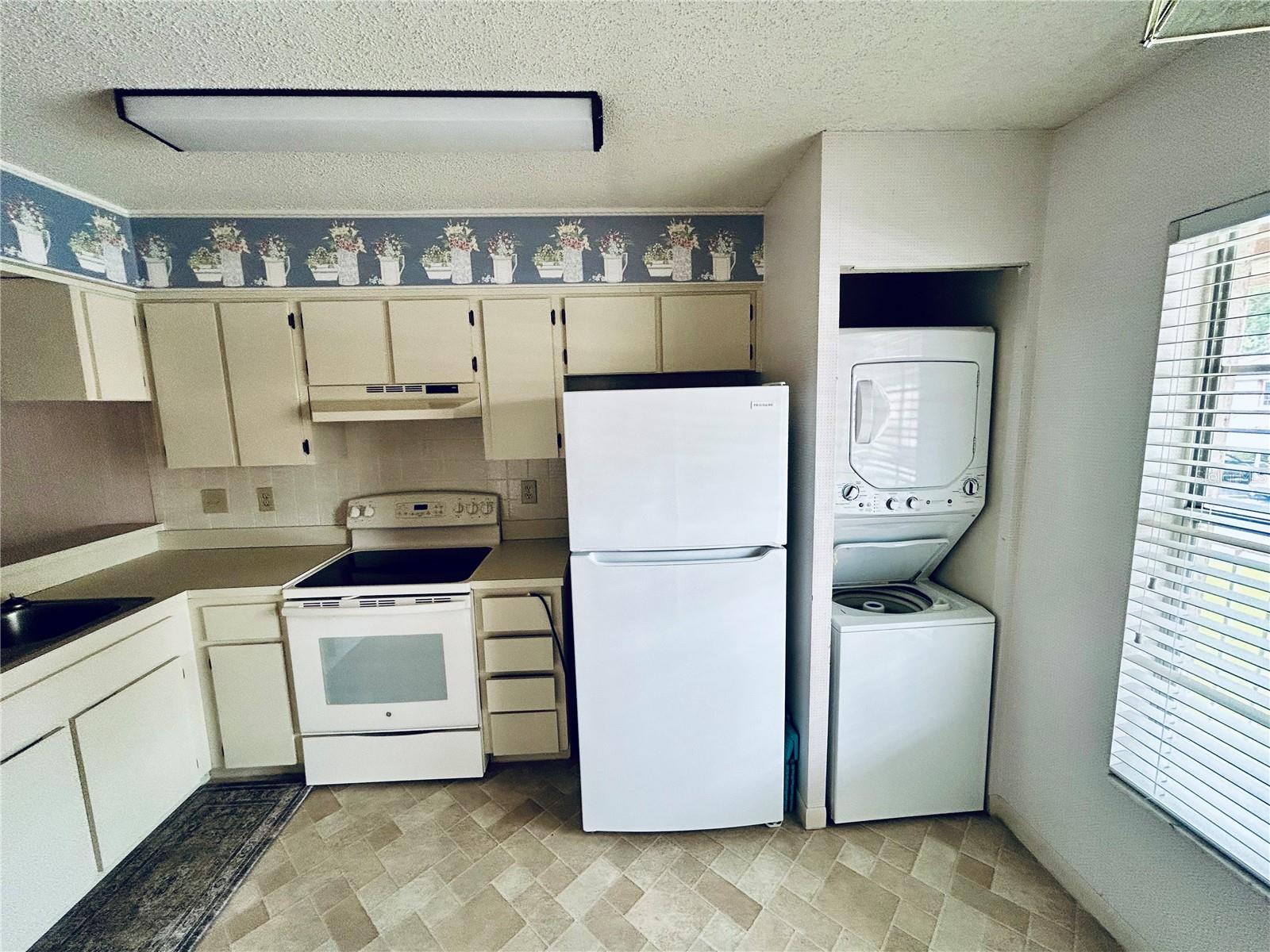 Washer & dryer in kitchen
