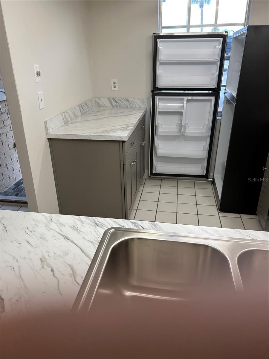 kitchen with window and extra work space