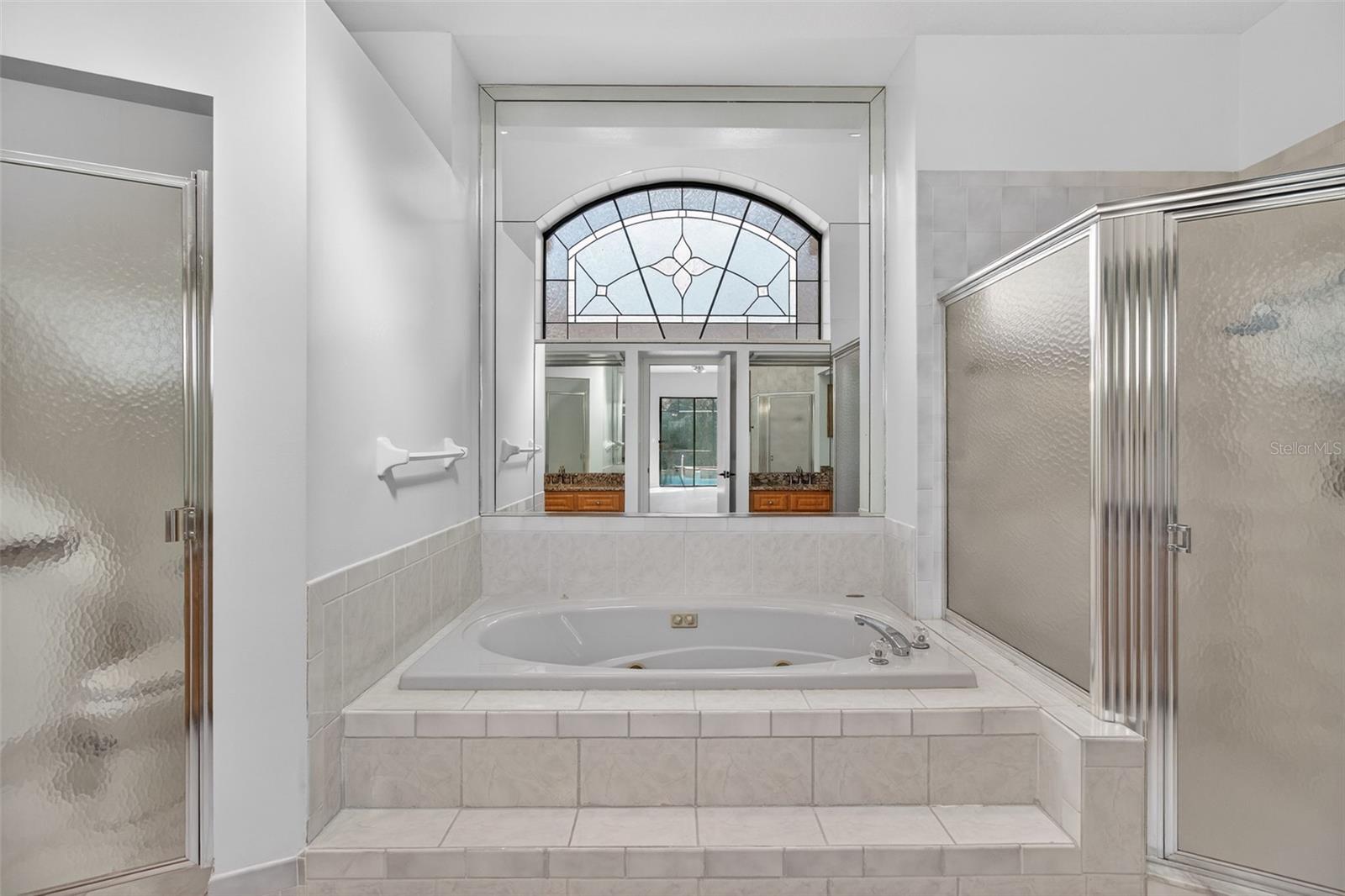 Large primary bathroom, with jet tub and standalone shower