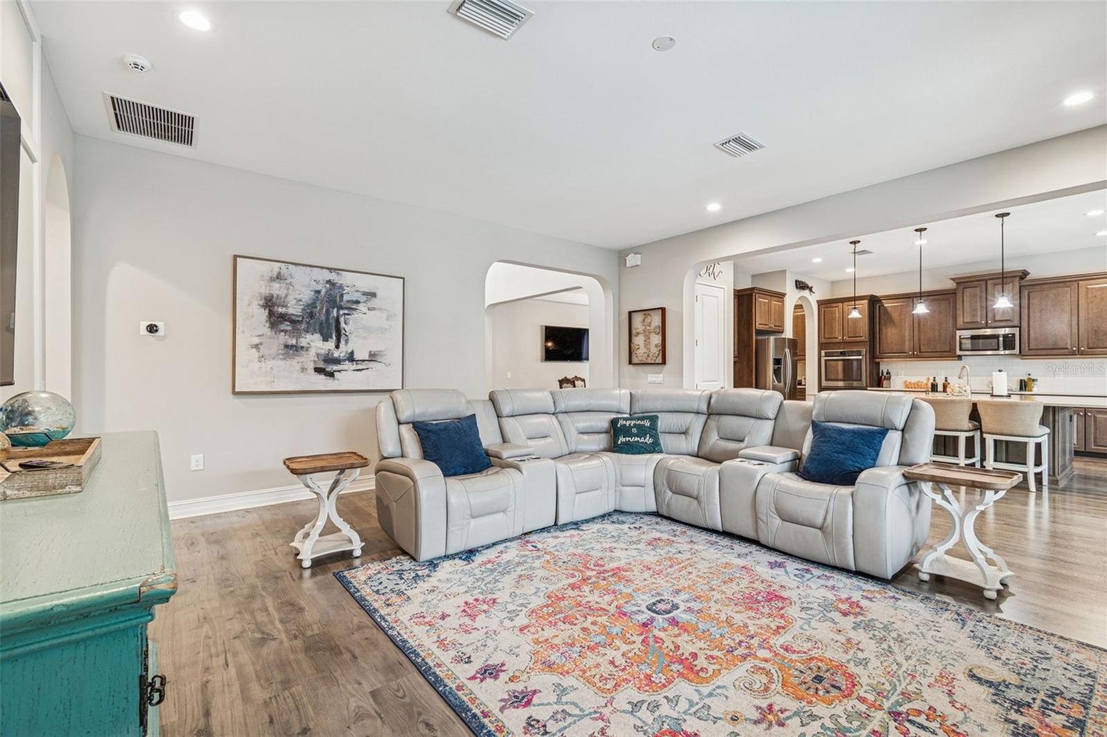 Open living area with view of the kitchen
