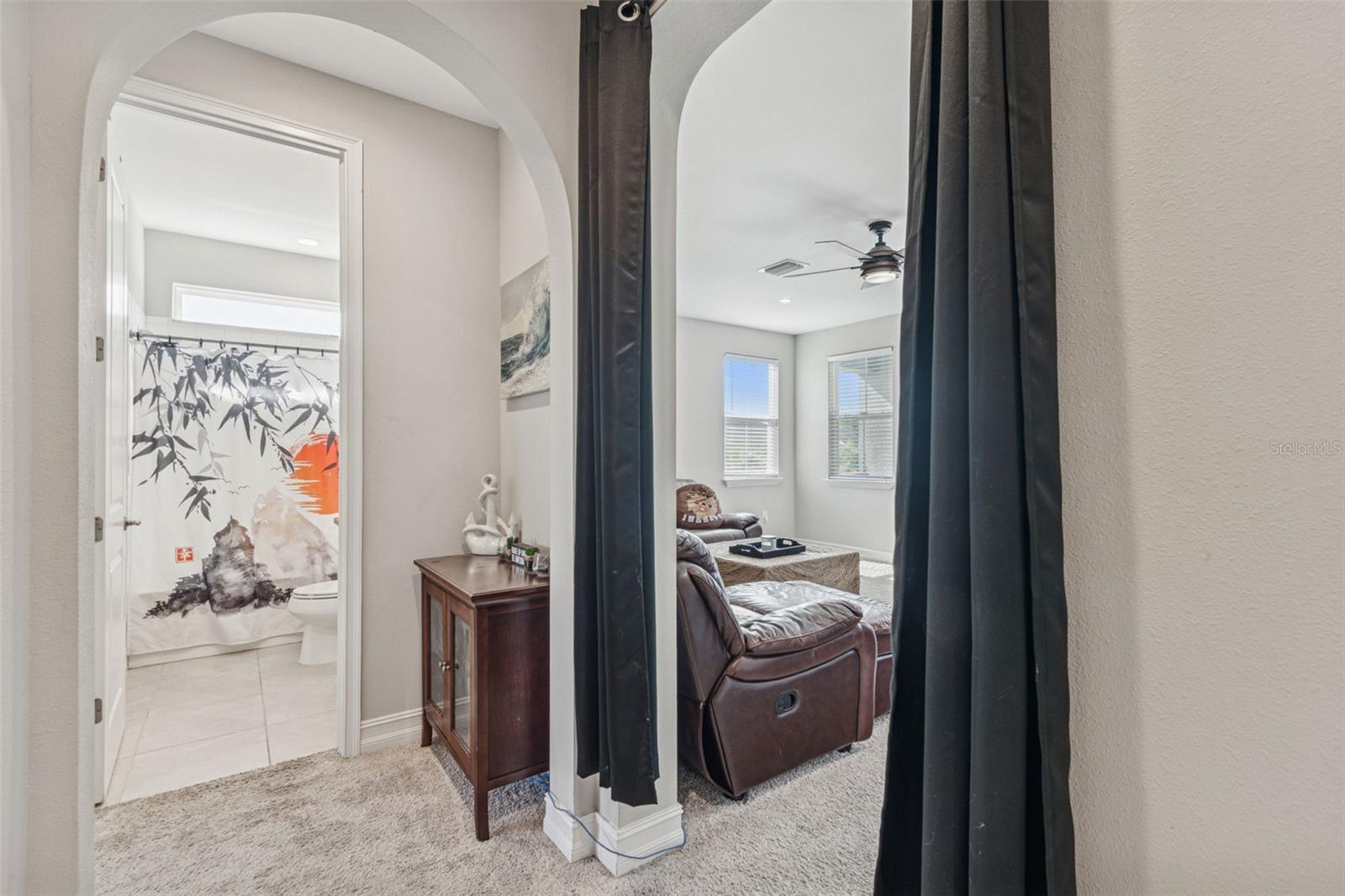 Upper-level loft and full bathroom